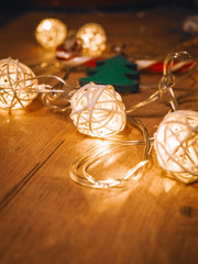 Christmas decorations closely photographed, wooden Christmas tree, rope, Lollipop, garland