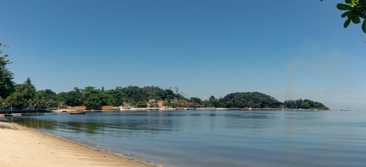 Fototapeta premium Panorama of Sao roque beach with cloudless blue sky, Paqueta, Rio de Janeiro, Brazil