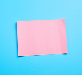 blue banner with pink paper sheet curly for paper design