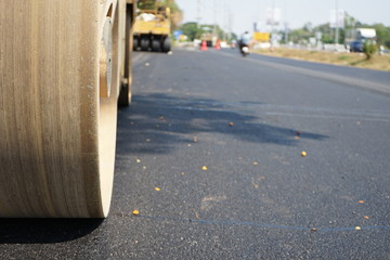 Asphalt road construction in Thailand, blurred pictures