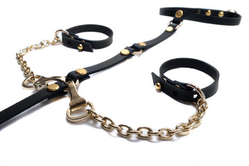 Leather belt for a girl on a white background.