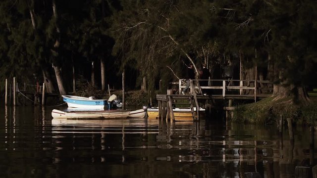Old Row Boats And Motorboats In A Quay On An Island In Tigre, Argentina.