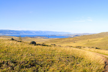 Obraz premium landscape with hills and blue sky and lake