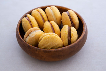 melting moment cookies inside the wooden bowl