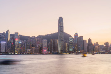 Obraz premium Panorama of Victoria harbor of Hong Kong city, from day to night Cold front in December.