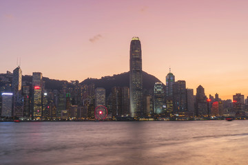 Panorama of Victoria harbor of Hong Kong city, from day to night Cold front in December.