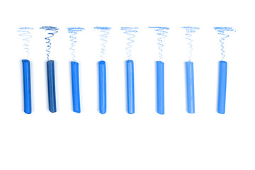 Colorful pencils on white.