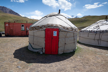 Yurts in the village on the road trip from Osh Kyrgyzstan to Tajikistan through the Pamir highway