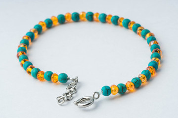 Handmade bracelet made of artificial turquoise and glass rondels