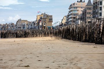 Fototapeta na wymiar Big breakwater and beach in Saint Malo, 3000 trunks to defend the city from the tides, Ille-et-Vilaine, Brittany, France