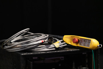 Remote control and wires on the concert backstage