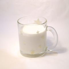 Cold milk fresh in a cup of translucent glass