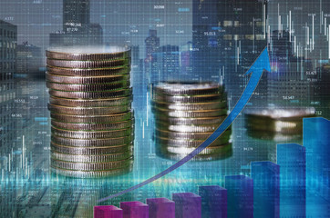 a stack of money growth coins. Double exposure of graph and rows of coins for financial and business concept. Image is tinted.