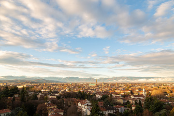 Fototapeta na wymiar Aerial view of the city of Vicenza in Italy at sunset. The city of Palladio, from the name of the architect who designed most of his works here in the late Renaissance.