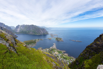 Fototapeta na wymiar Panoramic view of the fishing town of Reine from the top of the Reinebringen viewpoint in the Lofoten Islands, Norway