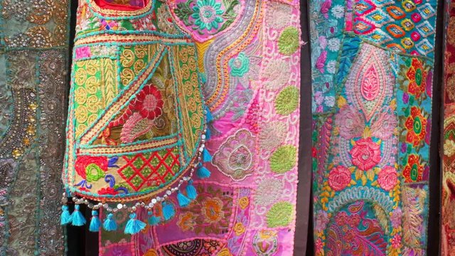 Traditional textile patchwork made of embroidery and stitched out of colored pieces of fabric. Bazaar in Pushkar, Rajasthan, India