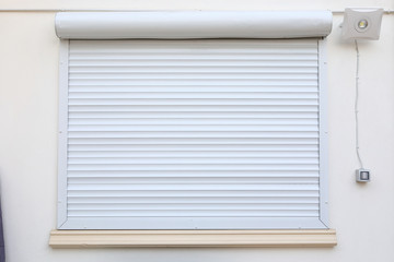 white window roller shutter closed security in modern house
