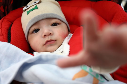 little baby boy so cute looking at camera