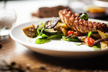 Octopus salad served on a plate in restaurant