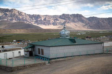Mosque in poor village on the Pamir highway in Tajikistan
