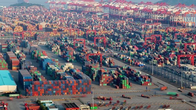 Chinese containers in Yangshan Port in Shanghai timelapse pan up