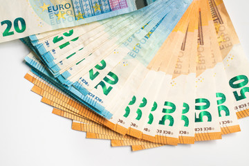 Euro zone money note spread on white background