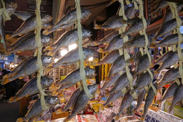 four lines of dried fish hung up on a food market, Seoul, South Korea, Asia