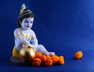 Hindu God Krishna on blue background