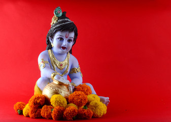 Hindu God Krishna on red background
