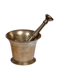 Antique brass pestle and mortar used isolated on a white background.