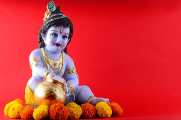 Hindu God Krishna on red background