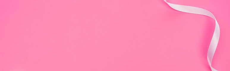 top view of satin ribbon isolated on pink, panoramic shot