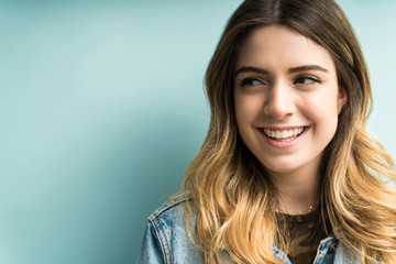 Closeup Of Beautiful Young Female Smiling In Studio
