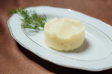 Mashed potatoes on a white plate