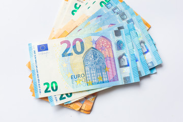 Euro zone money note spread on white background