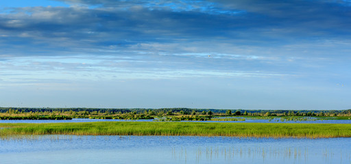 landscape with lake and blue sky