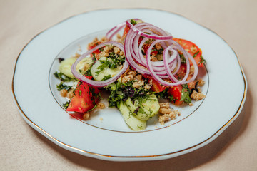 sliced vegetables on a white plate