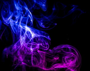 Colored smoke on black background