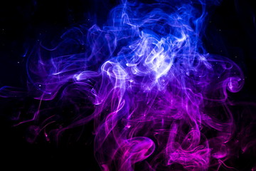 Colored smoke on black background
