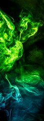 Obraz premium Colored smoke on black background