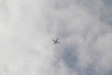 Aircraft in flight through the clouds