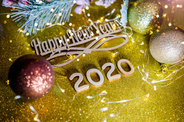 Happy new year 2020 on gold shiny background