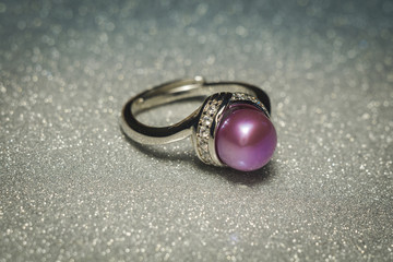 Silver ring with purple pearl