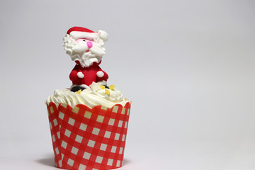 Christmas cupcakes decorated with Santa Claus.