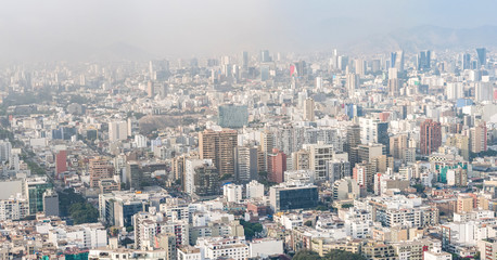 Ungraded aerial view of the build of Lima city, in Peru.