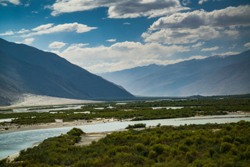 View on Wakhan Corridor in Afghanistan behind the Wakhan river. Taken from Pamir highway on Tajikistan side.