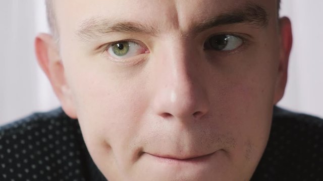 Running eyes of a liar or a worried person, close-up