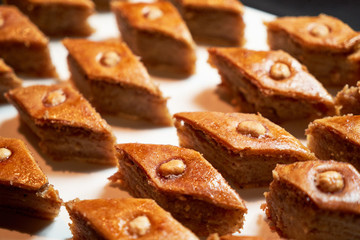 Fototapeta na wymiar Baklava with nuts and honey. Novruz tray with Azerbaijan national pastry.