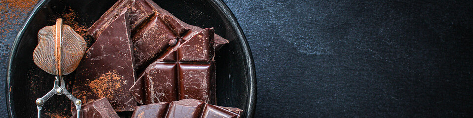 chocolate (delicious cocoa dessert, pieces of sweets) menu concept. food background. top view. copy space