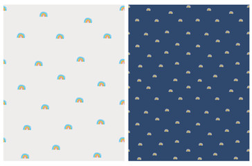 Infantile Style Seamless Vector Pattern with Hand Drawn Colorful Rainbows. Lovely Nursery Art for Fabric, Wrapping Paper, Card.Cute Print with Rainbow Isolated on a Off-White and Dark Blue Background.